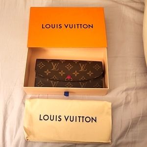Brand new Louis Vuitton Emilie wallet fuchsia